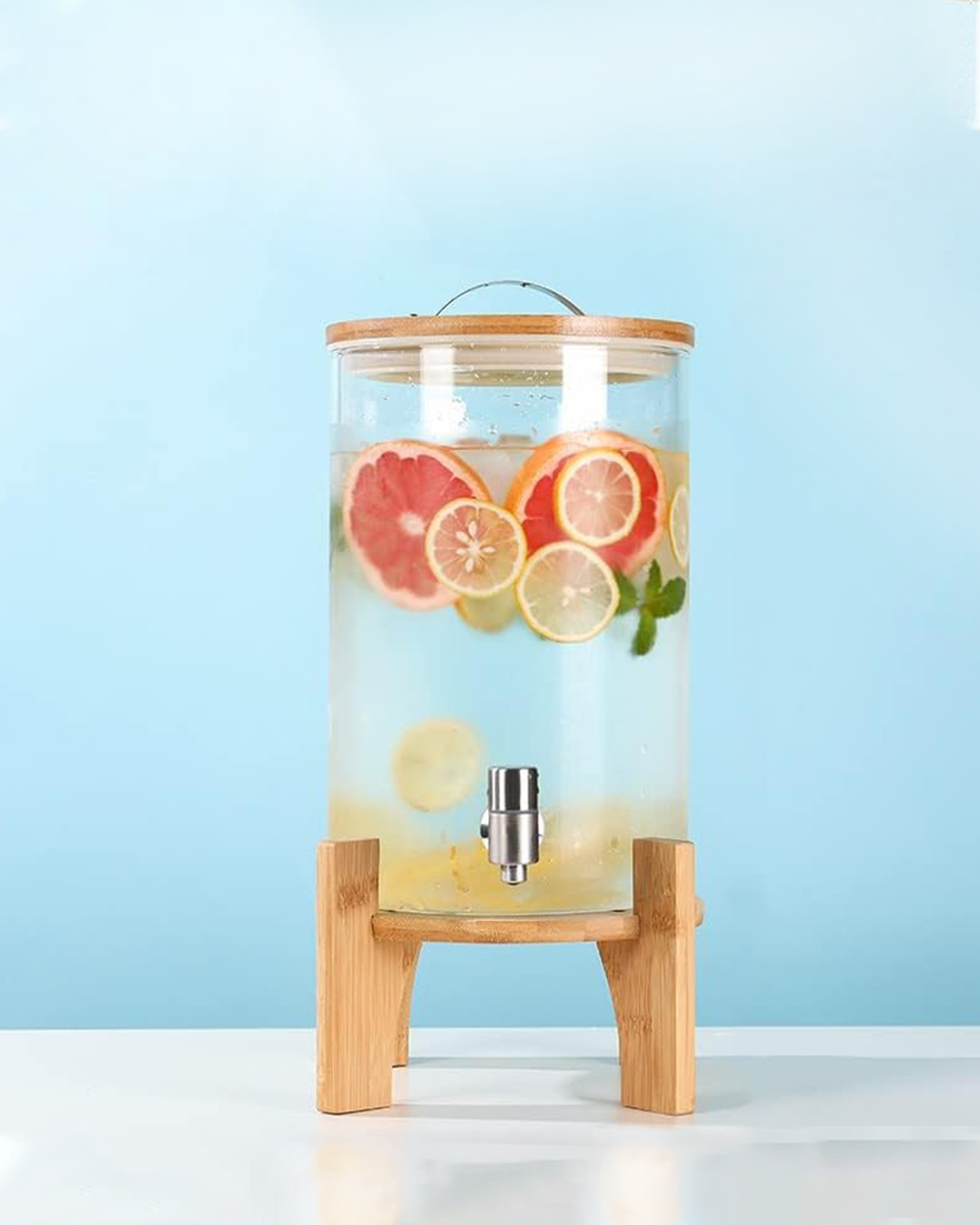 𝗢𝗦𝗔𝗞𝗔 𝟵, 𝟳 𝗬 𝟱 𝗟𝘁𝘀. - Dispensador apto para líquidos calientes 🔥 Vidrio borosilicato con caño de acero. Tapa hermética. Base de madera.