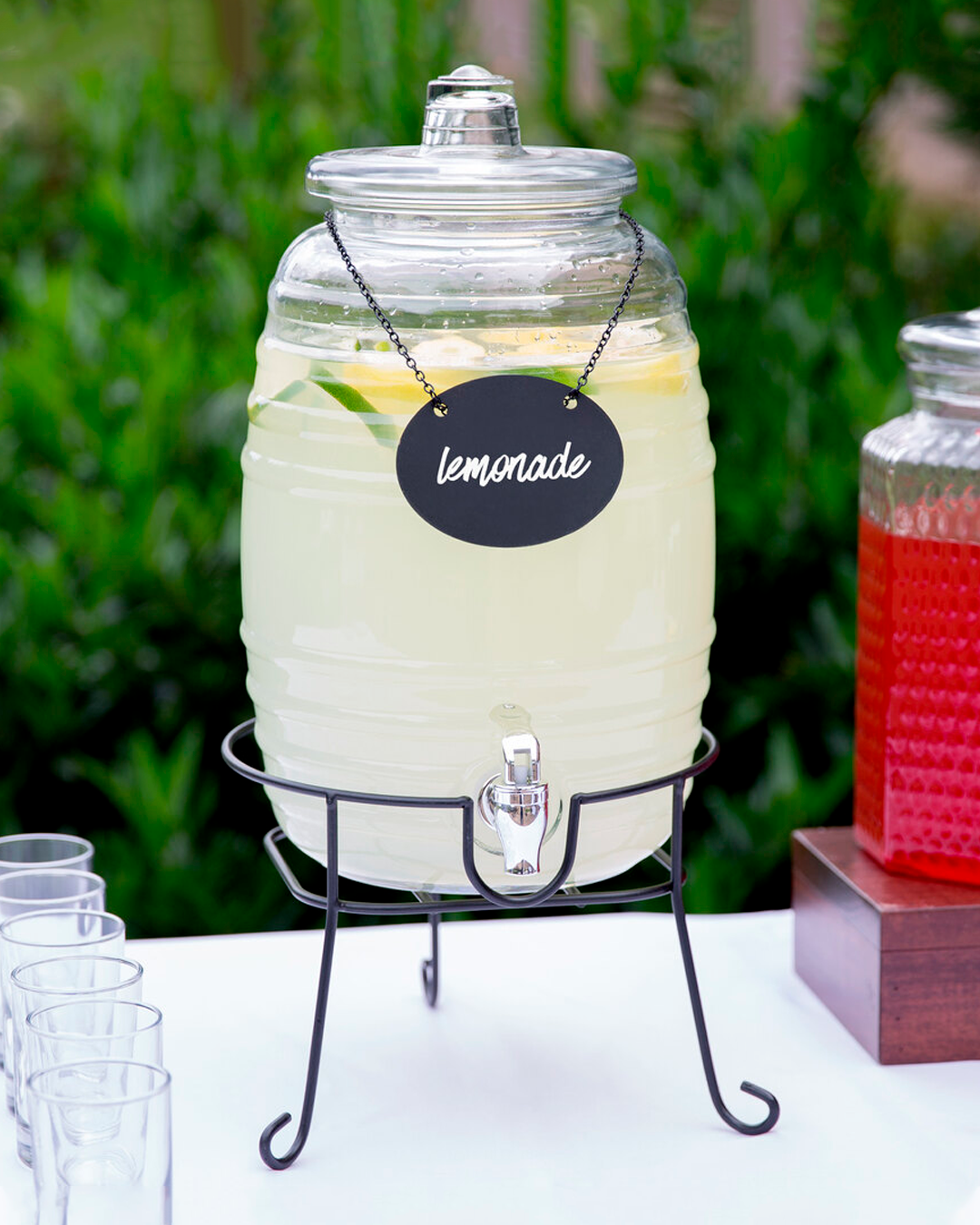 𝗥𝗜𝗡𝗚𝗢 𝟭𝟬 𝗟𝘁𝘀. - Dispensador de vidrio con soporte de metal.