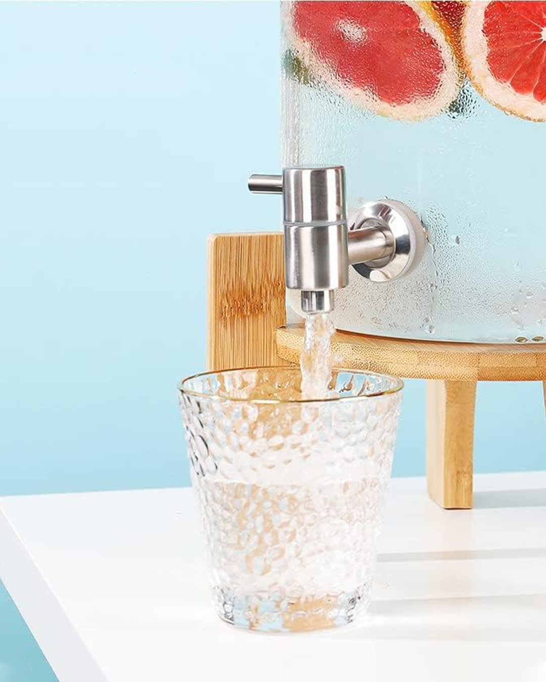 Dispensador de bebidas de vidrio borosilicato con caño de acero. Apto para líquidos calientes. Resiste hasta 80°C 
- QOSMO PERU